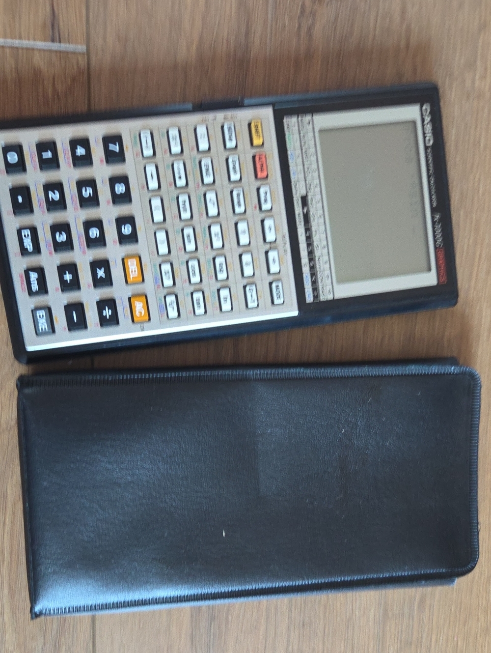 Casio Scientific Calculator in Black and White with Leather Case